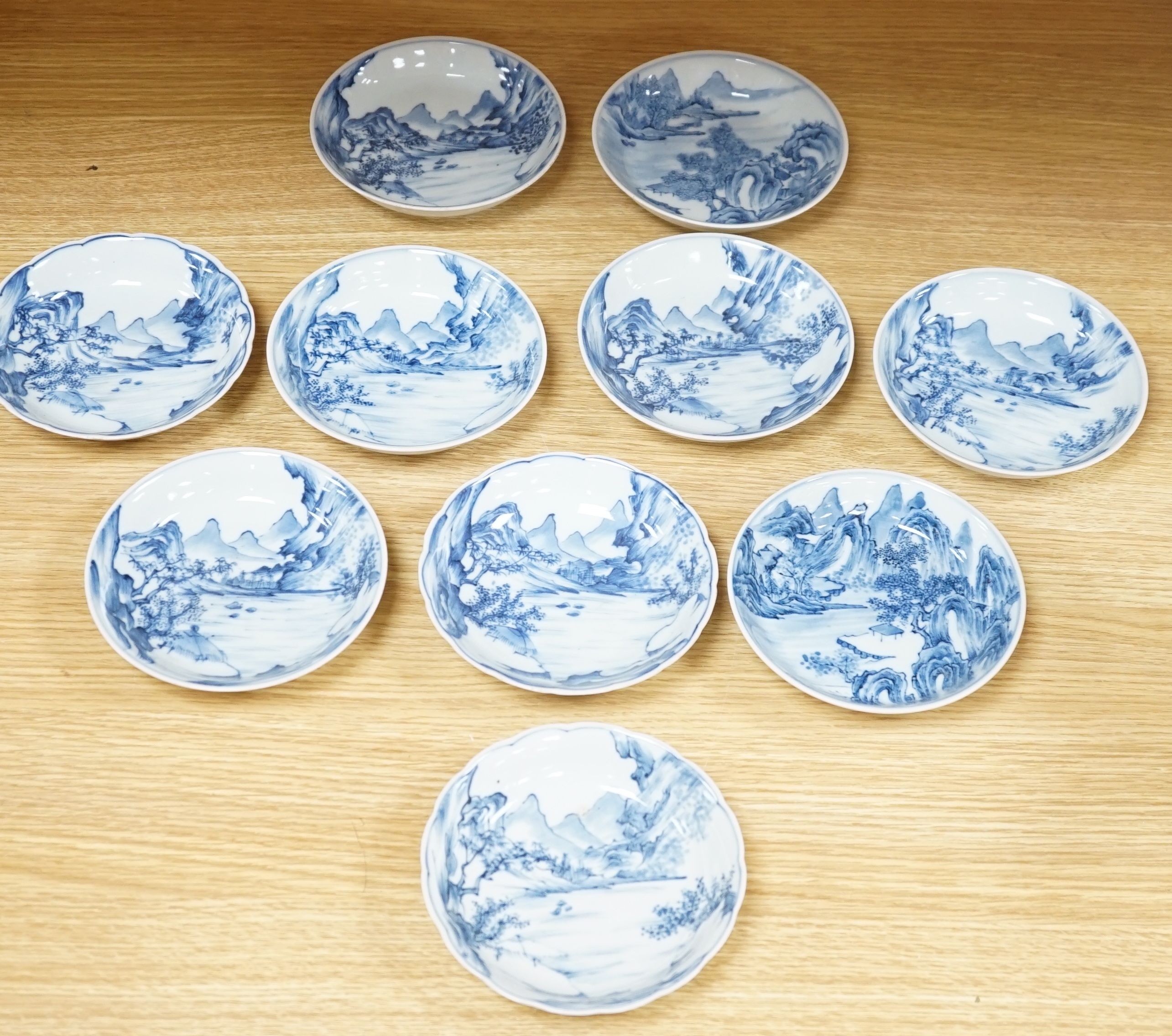 Ten Chinese blue and white ‘landscape’ dishes, 13.5cm diameter